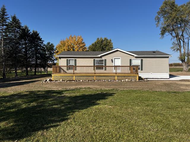 front view picture of 8024 Scott Road, Saranac, MI. 48809
