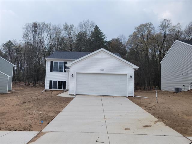 front view picture of 1109 Cedarwood Drive, Greenville, MI. 48838