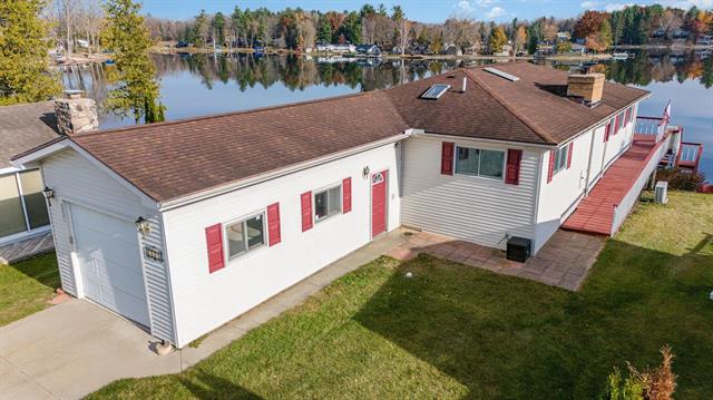 front view picture of 8821 S Old State Avenue, Farwell, MI. 48622