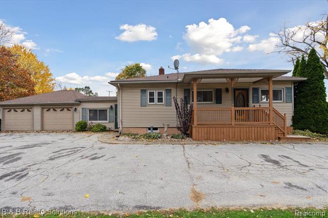 front view picture of 4360 Huron Street, North Branch, MI. 48461