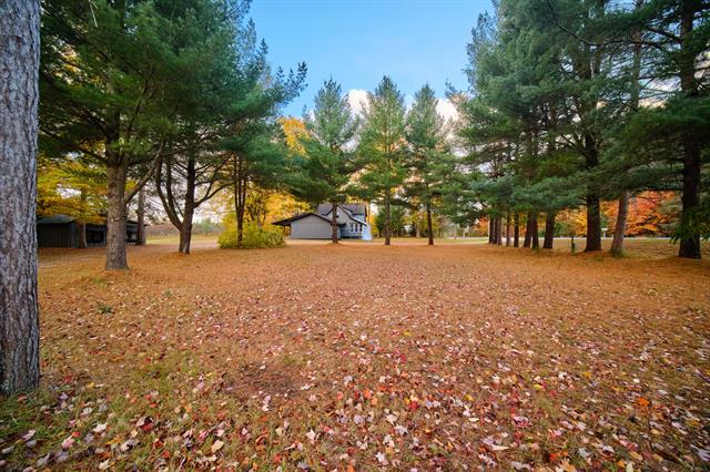 front view picture of 15049 Healy Lake Road, Bear Lake, MI. 49614
