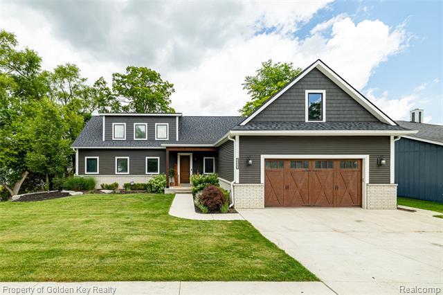 front view picture of 1210 W Oakley Park Rd, Walled Lake, MI. 48390