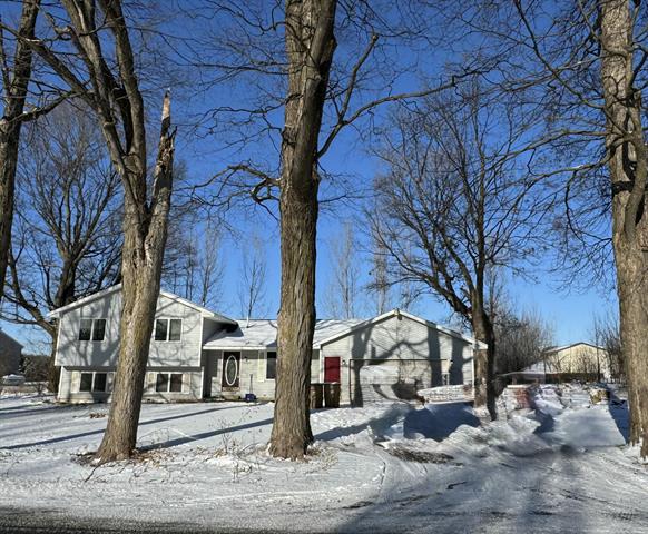front view picture of 8997 Peterson Street Ne, Rockford, MI. 49341