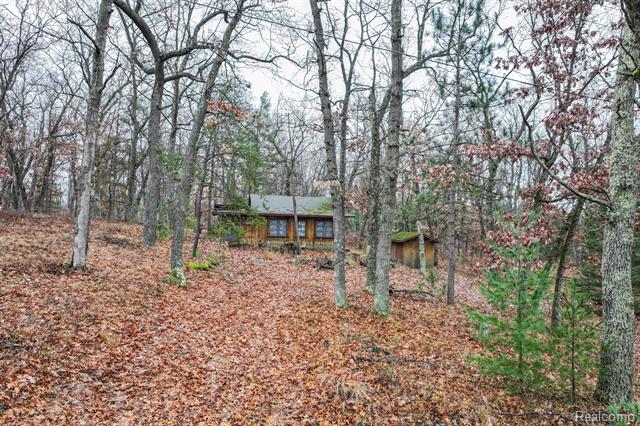 front view picture of 317 Robert Road, Harrison, MI. 48625