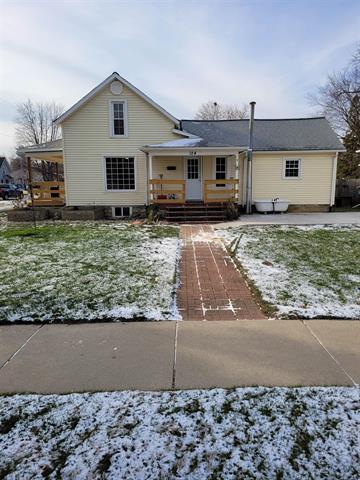 front view picture of 124 S Main Street, Saint Louis, MI. 48880