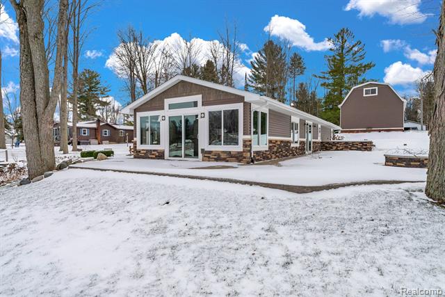 front view picture of 1571 Loebrich Drive, Gladwin, MI. 48624