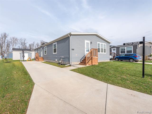 front view picture of 10747 S Brookston Drive, Willis, MI. 48191