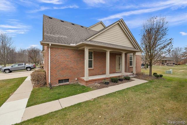front view picture of 22559 Manistee River Drive, Macomb, MI. 48042