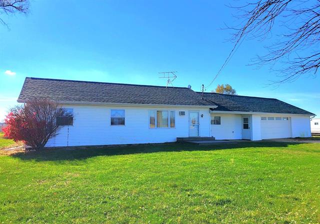 front view picture of 8758 E Fillmore Road, Ithaca, MI. 48847