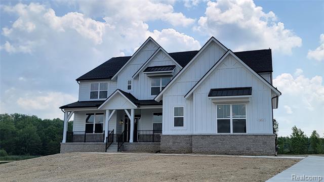front view picture of 56207 Hickory Creek Lane, New Hudson, MI. 48165