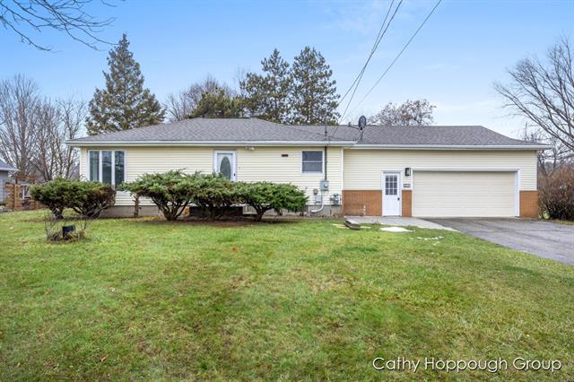 front view picture of 4392 S Sheridan Road, Sheridan, MI. 48884