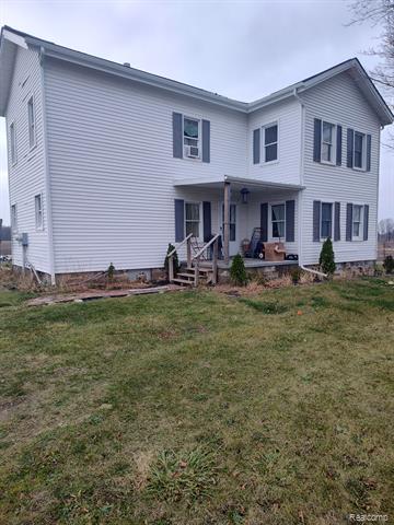 front view picture of 8789 Fowlerville Road, Fowlerville, MI. 48836
