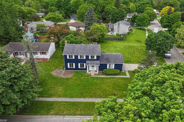 front view picture of 406 Windmill Point Drive, Flushing, MI. 48433