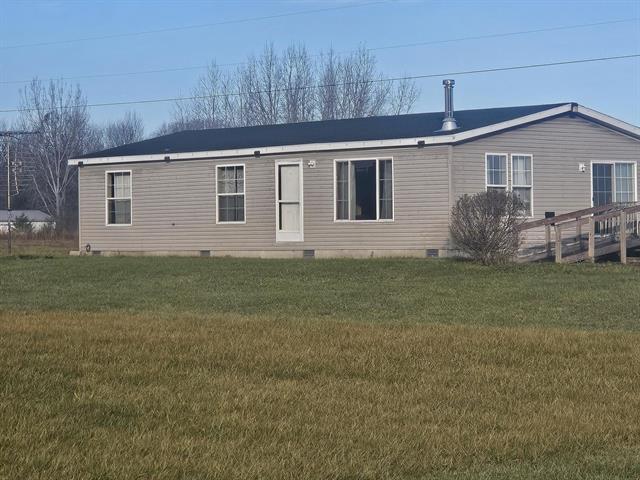 front view picture of 9786 W Drew Road, Weidman, MI. 48893