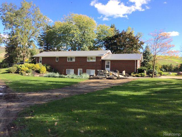 front view picture of 8365 Torrey Road, Grand Blanc, MI. 48439