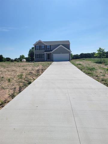 front view picture of 6185 Greenbriar Drive, Lowell, MI. 49331