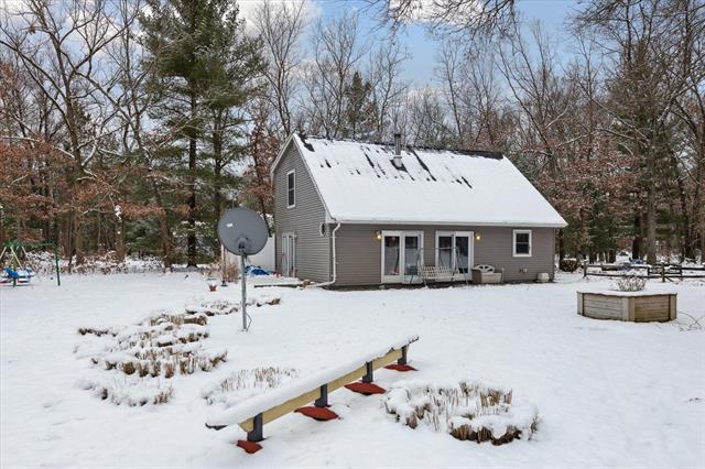 front view picture of 11672 S Red Cedar Avenue, Baldwin, MI. 49304
