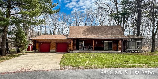 front view picture of 8227 W Taylor Road, Mears, MI. 49436