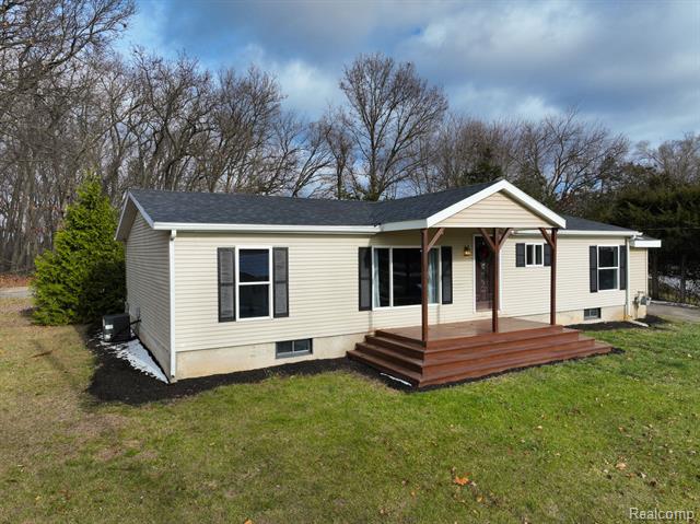 front view picture of 511 1St Street, Gregory, MI. 48137