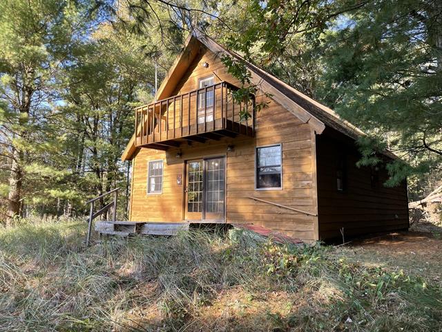 front view picture of 5680 E East Shores Drive, Free Soil, MI. 49411