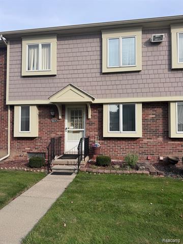 front view picture of 19975 S Great Oaks Circle, Clinton Township, MI. 48036