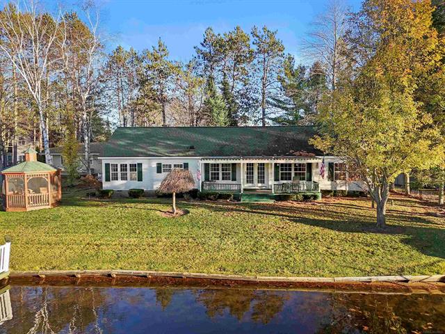 front view picture of 210 Atwood Drive, Prudenville, MI. 48651