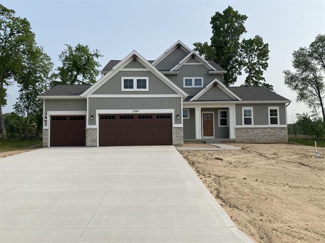front view picture of 7849 Woodhurst Drive Ne, Rockford, MI. 49341