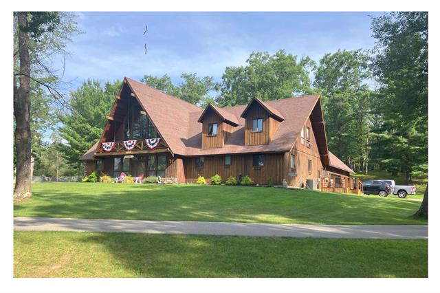 front view picture of 2061 N Ogemaw Trail, West Branch, MI. 48661