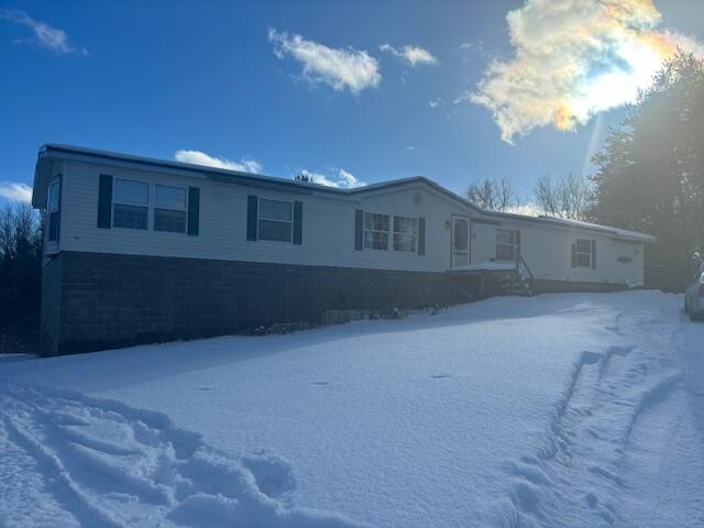 front view picture of 23779 9 Mile Road, Reed City, MI. 49677