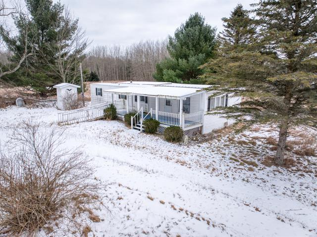 front view picture of 14128 100Th Avenue, Rodney, MI. 49342