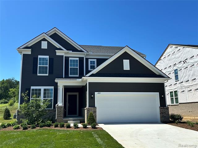front view picture of 4881 Marquette Drive, Milford, MI. 48381