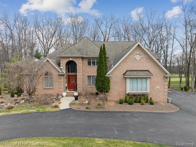 front view picture of 1449 Gleneagles, Highland, MI. 48357