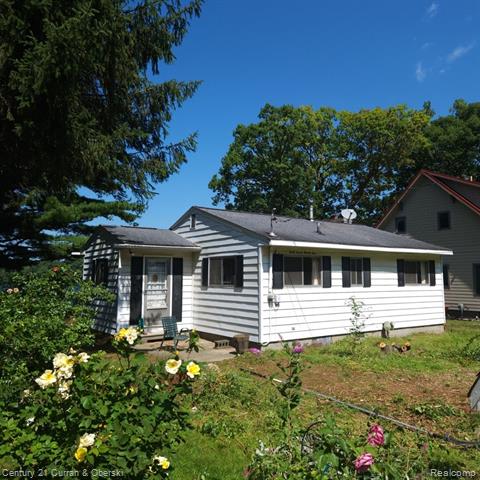 front view picture of 4724 Clear Lake Shores Drive, Grass Lake, MI. 49240