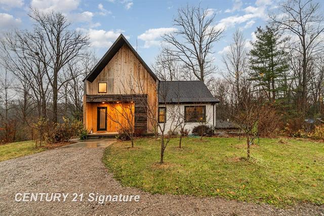 front view picture of 717 W Mayfly Drive, Beaverton, MI. 48612