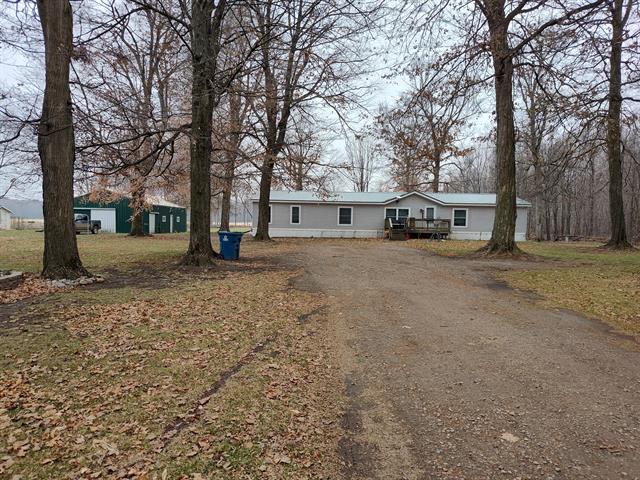 front view picture of 1233 Robinson Road, Quincy, MI. 49082