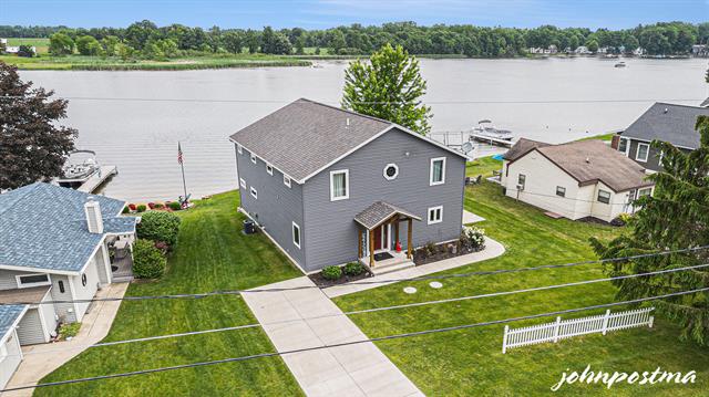 front view picture of 681 W Clifford Lake Drive, Stanton, MI. 48888