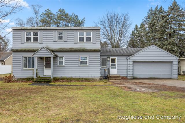 front view picture of 520 6 Mile Road Nw, Comstock Park, MI. 49321