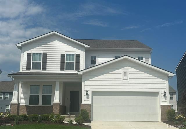 front view picture of 848 Kuss Drive, Saline, MI. 48176