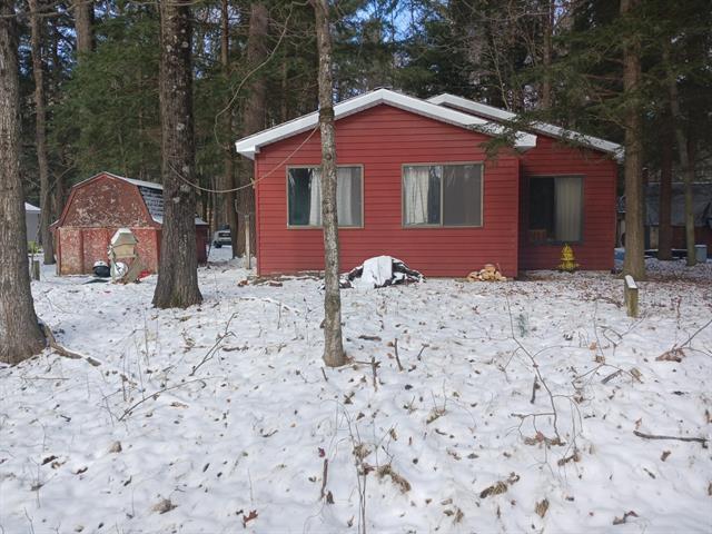 front view picture of 17341 Old Logging Road, Hersey, MI. 49639