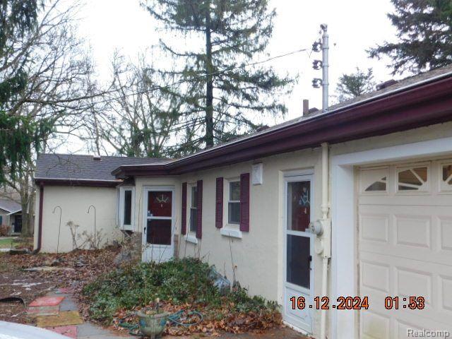 front view picture of 9010 N State Road, Otisville, MI. 48463