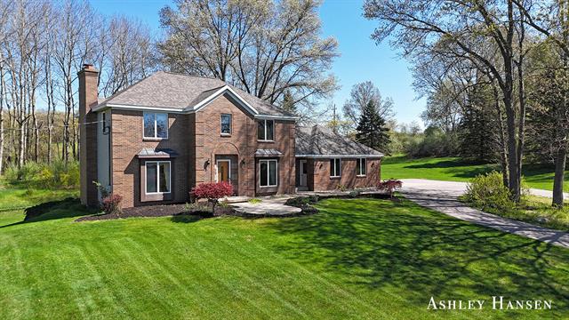 front view picture of 7860 Myers Lake Avenue Ne, Rockford, MI. 49341