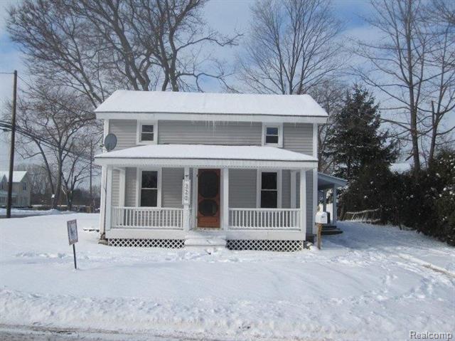front view picture of 320 Dean St, Milford, MI. 48381