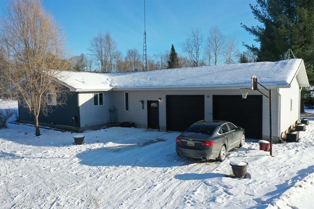 front view picture of 1091 Quigley Road, West Branch, MI. 48661
