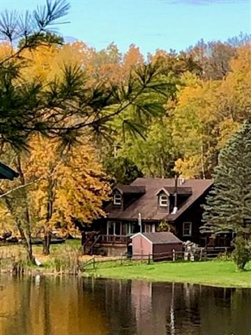 front view picture of 7176 Windoga Lake Drive, Weidman, MI. 48893