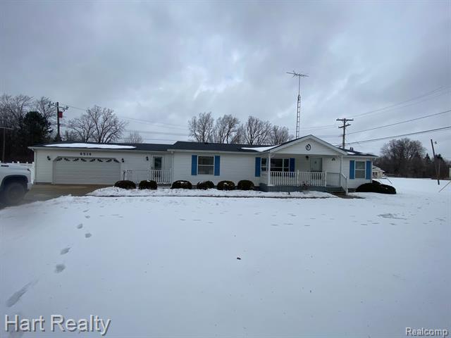 front view picture of 6516 Carpenter Street, Marlette, MI. 48453