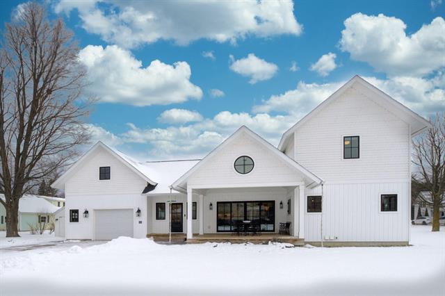 front view picture of 308 S Main Street, Leland, MI. 49654
