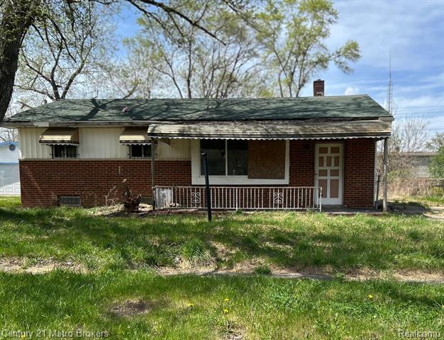 front view picture of 6099 Harwood Road, Mount Morris, MI. 48458