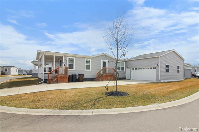 front view picture of 10748 Edwards Lane, Willis, MI. 48191