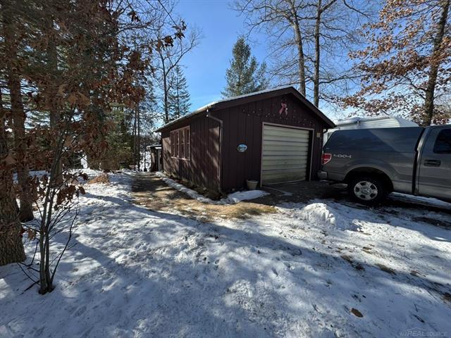 front view picture of 4690 E Arnold Lake Road, Harrison, MI. 48625