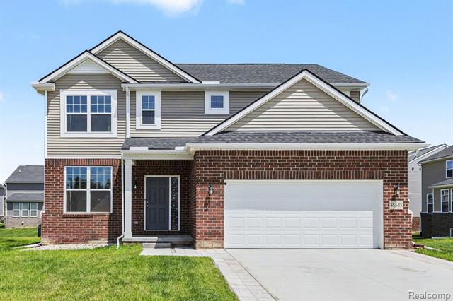 front view picture of 58648 Losino Drive, South Lyon, MI. 48178